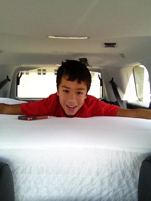 Mattress surfing in the back of our ride!